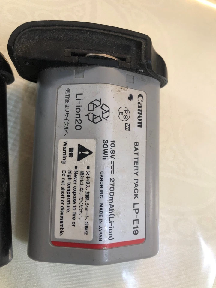 Paquete de 2 baterías Canon LP-E19 para EOS-1DX Mark II sin probar como están las piezas Foto 2 de 4