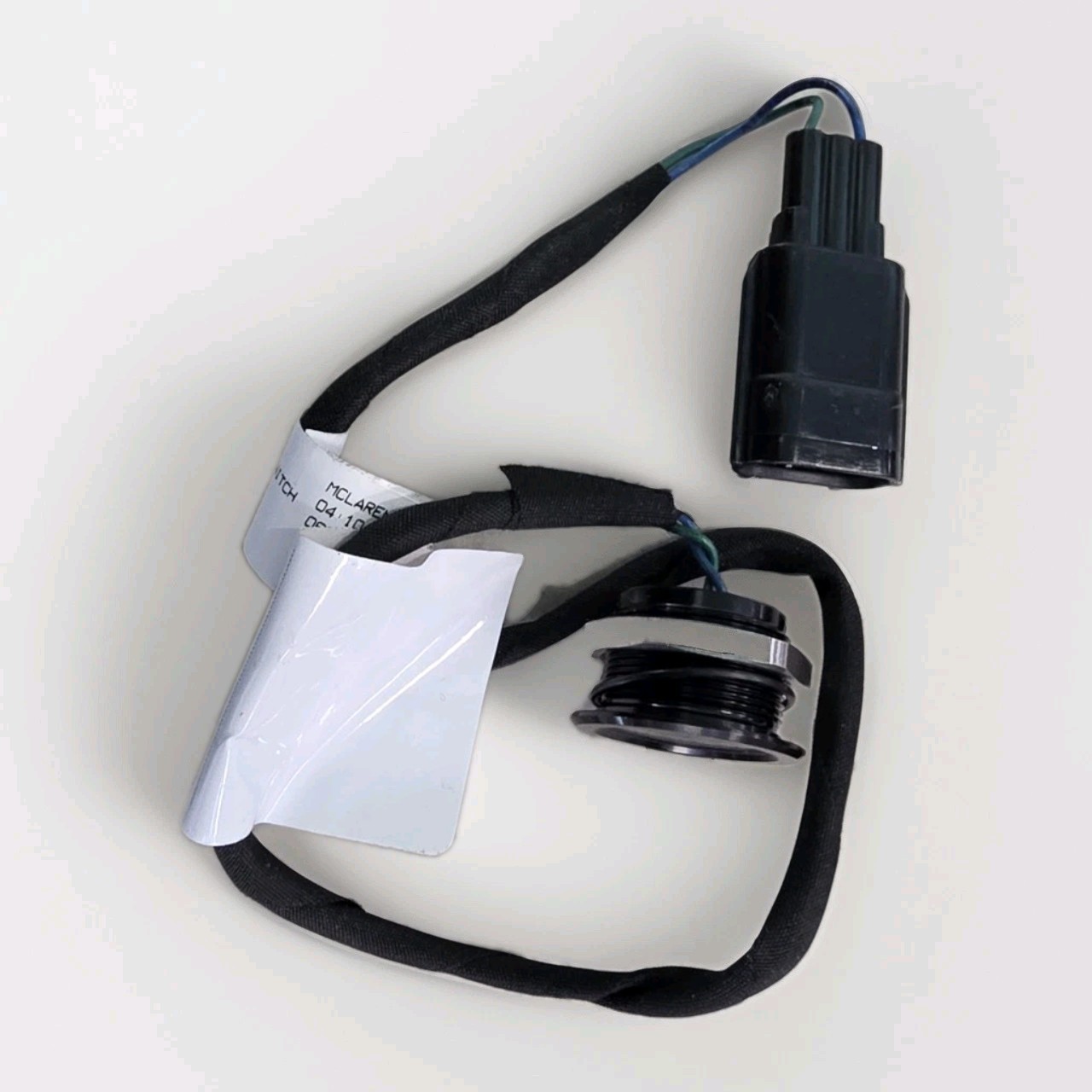 17- 23 720 McLaren 13MA028CP Left Quarter Door Lock Switch Genuine