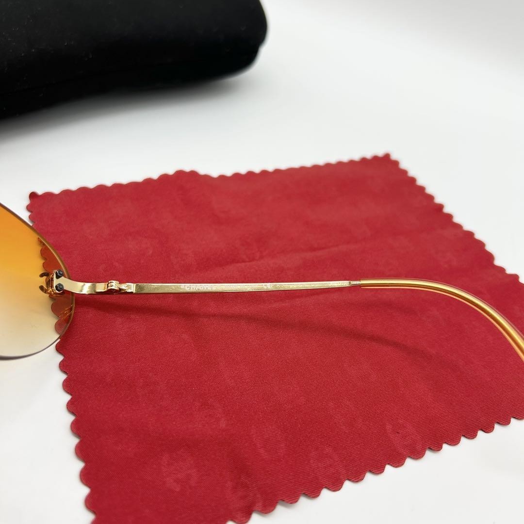 CHANEL CC Logo Rimless Sunglasses Orange Gradient Lens Gold