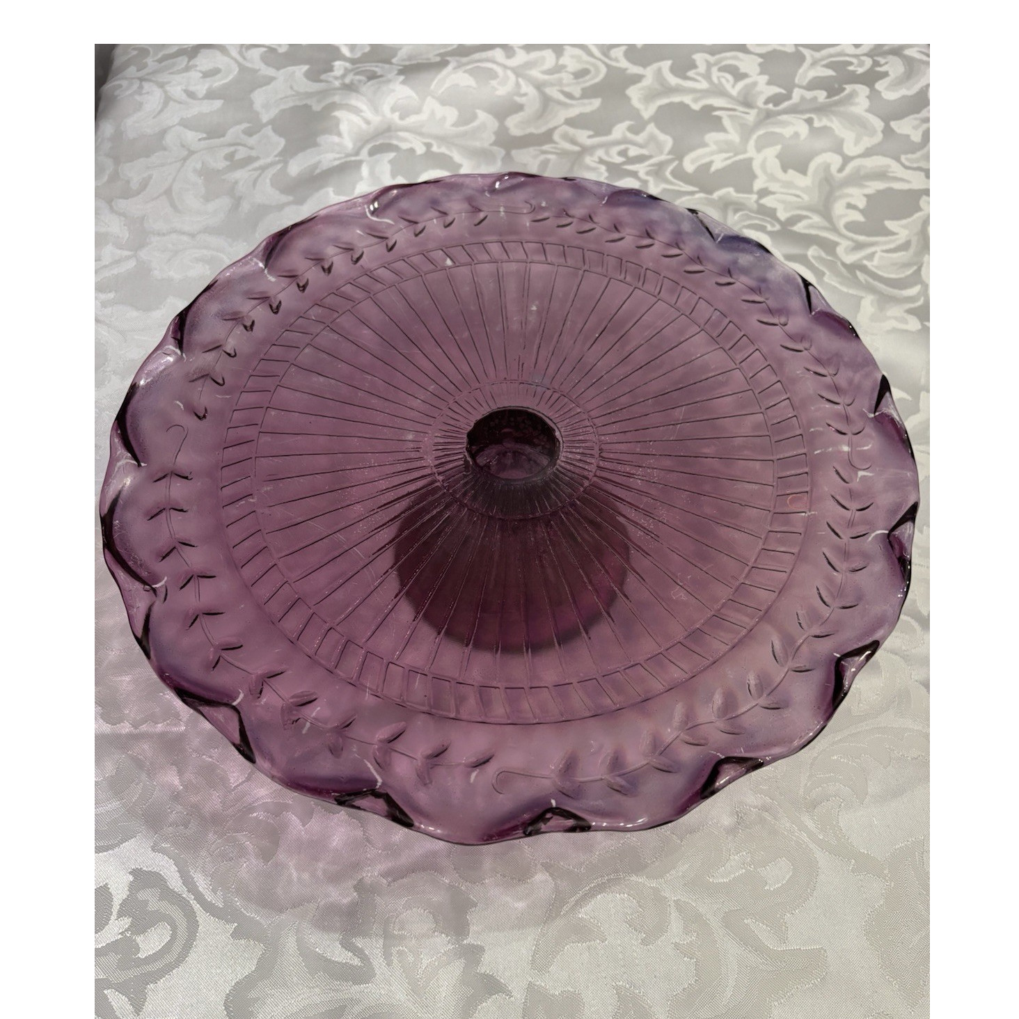 Amethyst Color Round Cake Plate with a Scalloped Edge on a Pedestal