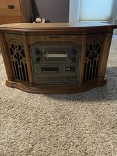 SYLVANIA entertainment system with radio, cd, tape, record player, Plus Records
