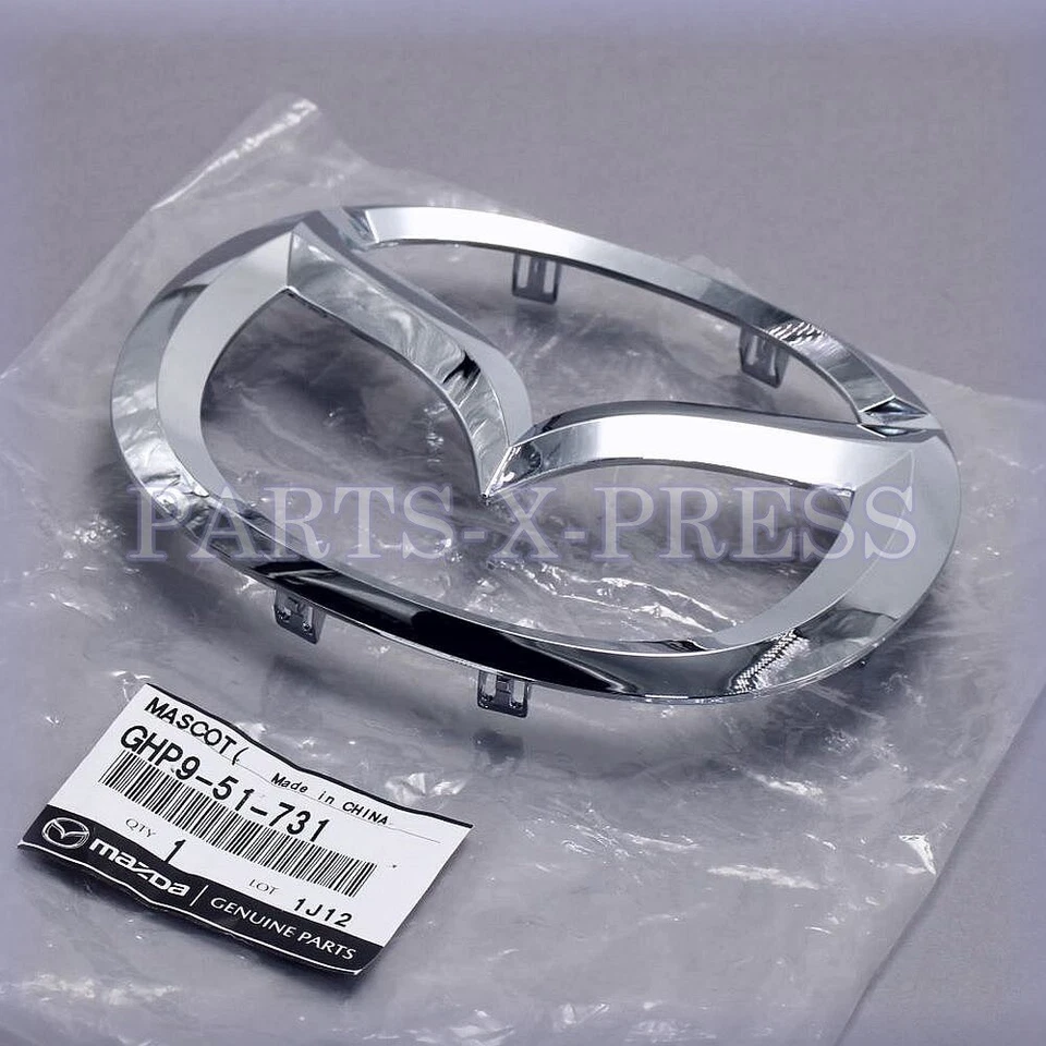 GHP9-51-731 NUEVO GENUINO FABRICANTE DE EQUIPOS ORIGINALES MAZDA 6 2014-2017 PLACA EMBLEMA REJILLA PLATEADA DELANTERA Foto 3 de 4