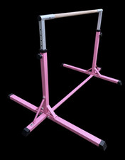 Adjustable indoor gymnastics bar in pink, suitable for children.