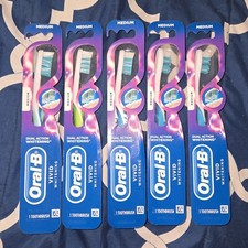 Lot of 5 Oral B Vivid Whitening Manual Toothbrush, Dual Action Medium Bristles