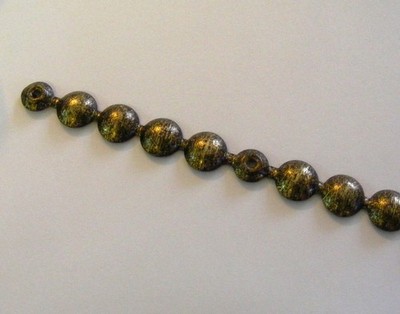 1 Stück Ziernagelstreifen a 1 mtr. 100 1/3 altgold gefleckt