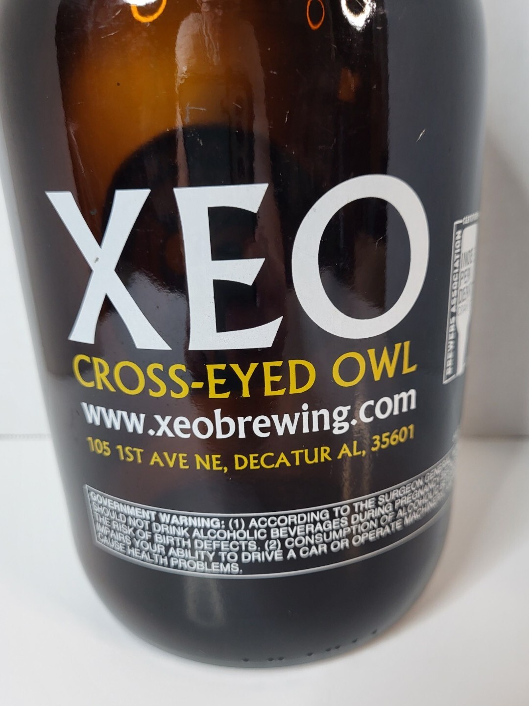 XEO CrossEyed Owl Brewing Co. Bottle 64 Fl Oz Beer Jug from Decatur
