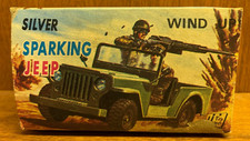Vintage 3.5" Silver Chrome Sparking Jeep Wind up Toy Made in Japan