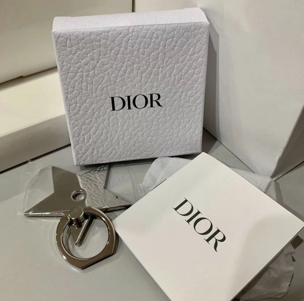 Dior phone ring deals