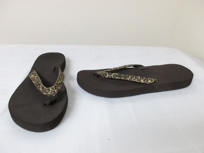 reef leopard flip flops