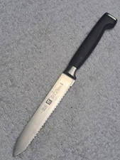 Zwilling J.A. Henckels Twin Four Star II 5" Serrated Utility Knife 30070-130