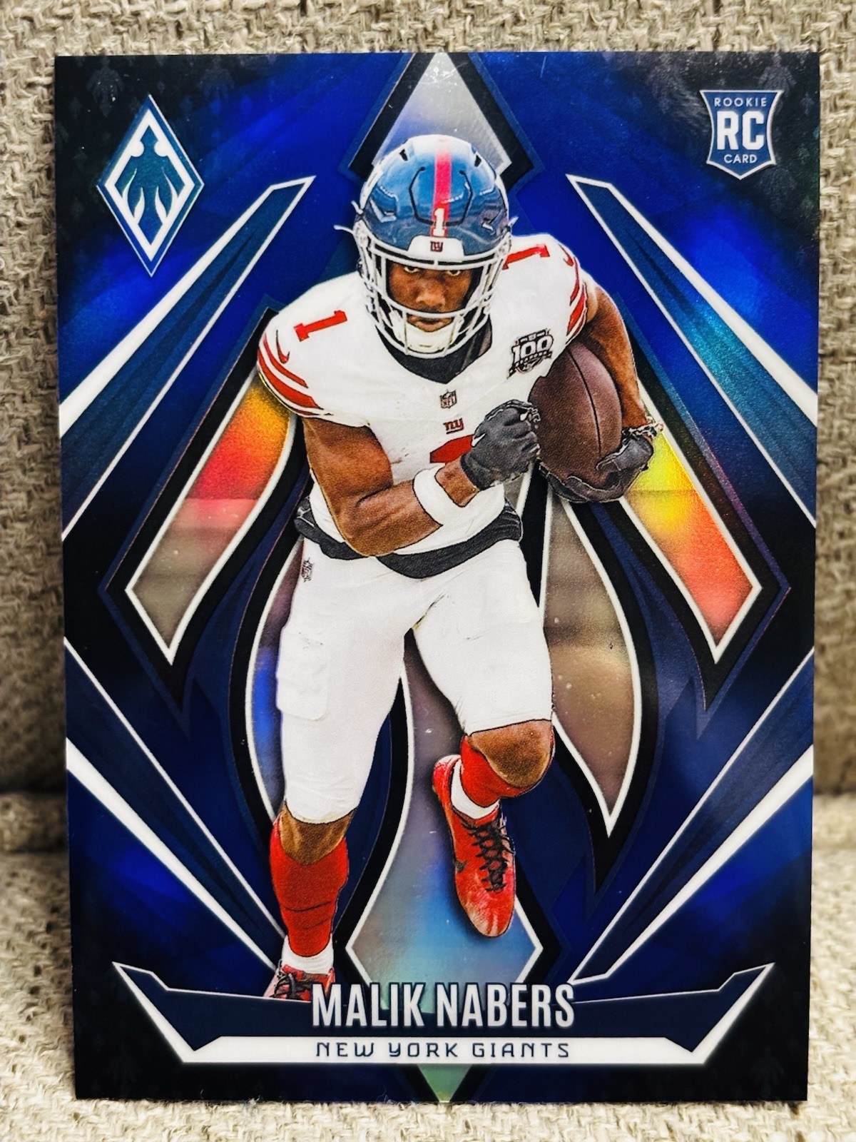 2024 Panini Phoenix - Rookies Malik Nabers #221 Blue Fade /249 (RC)