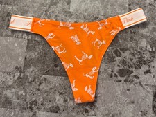 NWT VICTORIA'S SECRET PINK ORANGE WHITE SKELETON DOG HALLOWEEN THONG PANTIES