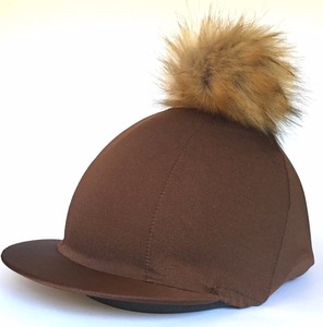 brown pom pom hat