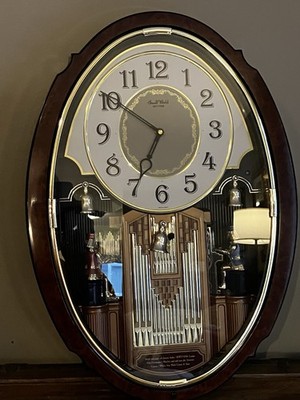 Rhythm Small World Woodgrain Moving Wall Clock 4MH752 Works Multiple Melodies