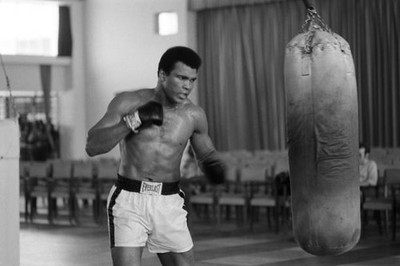 Muhammad Ali hitting heavy bag while training before fight v - 1974 Old Photo 2