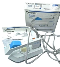 Norelco Vintage Spray/Dry Travel Iron Dual Voltage for Worldwide Travel T165