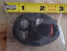 New old stock Genuine OEM 4 Button Keyless Entry Remote Key Fob - GM 10335586