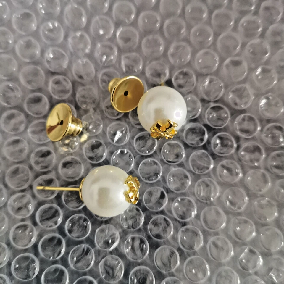 Auténticos aretes de perlas blancas Tory Burch Foto 2 de 2