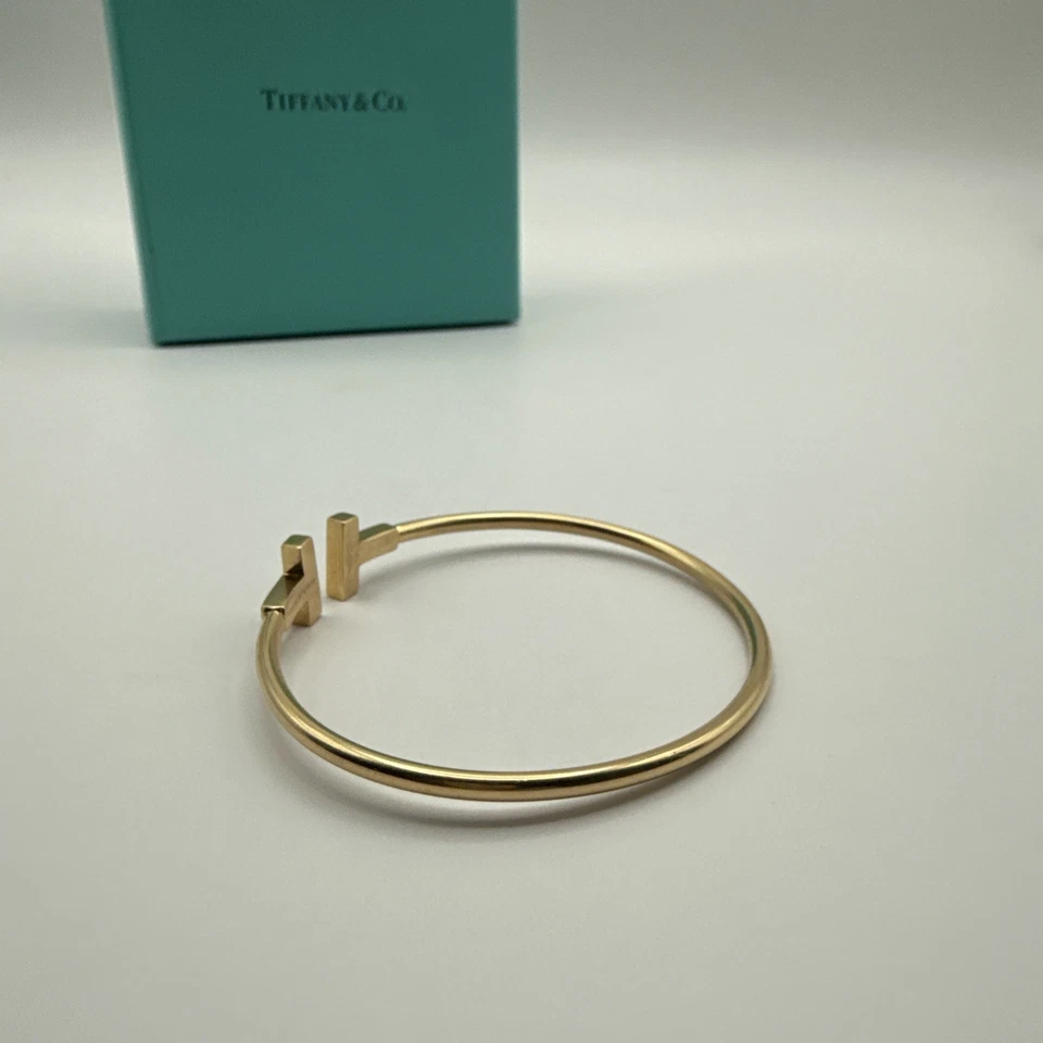 "Brazalete de alambre de diamantes en T de oro amarillo de 18 k Tiffany & Co tamaño grande de 0,24 quilates 6,75""" Foto 4 de 4