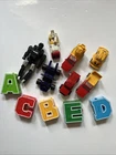 VINTAGE Esso Robot Racer G1 Transformer Gobots KO Lot Pretender Roller Rare Toy