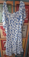 summery ladies dress, loose fitting never worn size 30