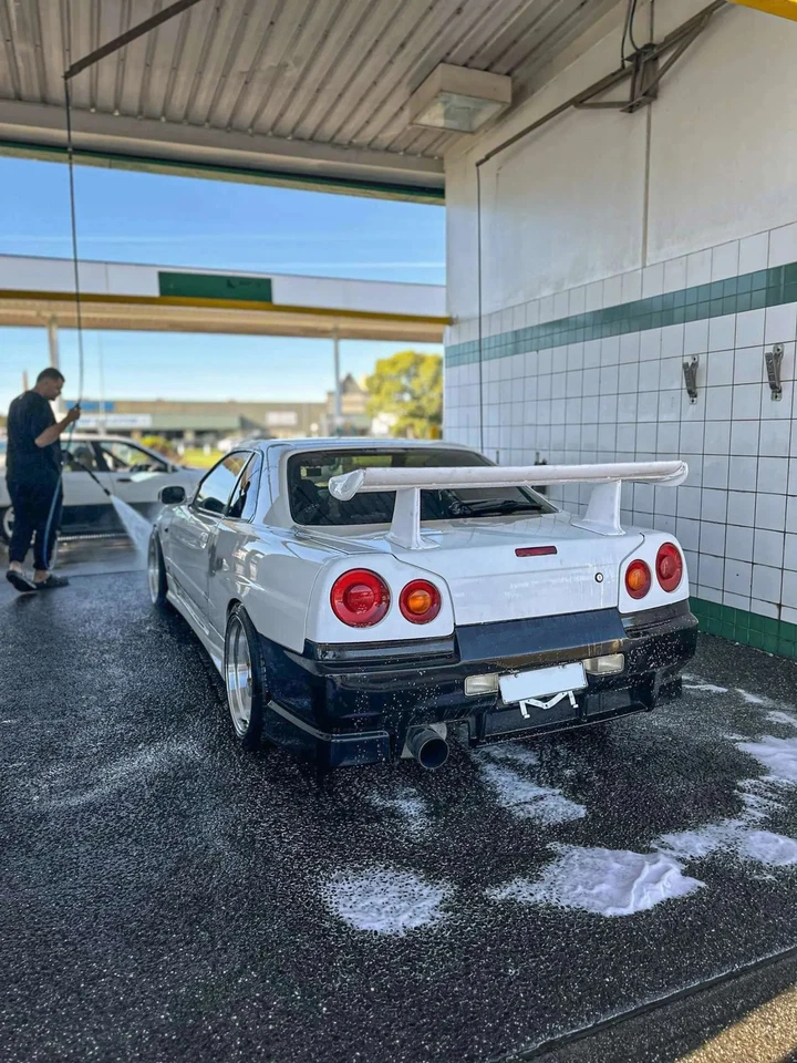 Задний спойлер из стекловолокна с высокой подставкой JUN для Nissan Skyline R34 GTR GTT OE - Изображение 2 из 3