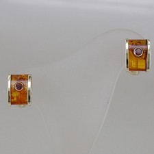 Ohrclips in 585/14k Gelbgold mit Bernstein und Granatbesatz