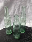 SET OF 3 COCA COLA- COKE GREEN GLASS BOTTLES  2 are Vintage-10 OZ & 1-8oz w/UPC