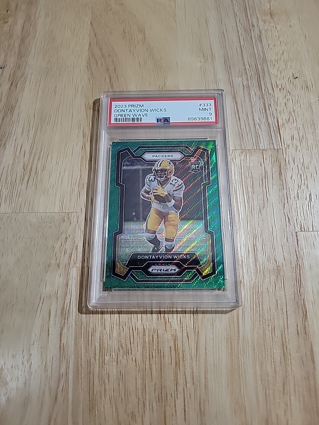 2023 Prizm DONTAYVION WICKS PSA 9 Green Wave Prizm #333 Rookie Packers SP MINT