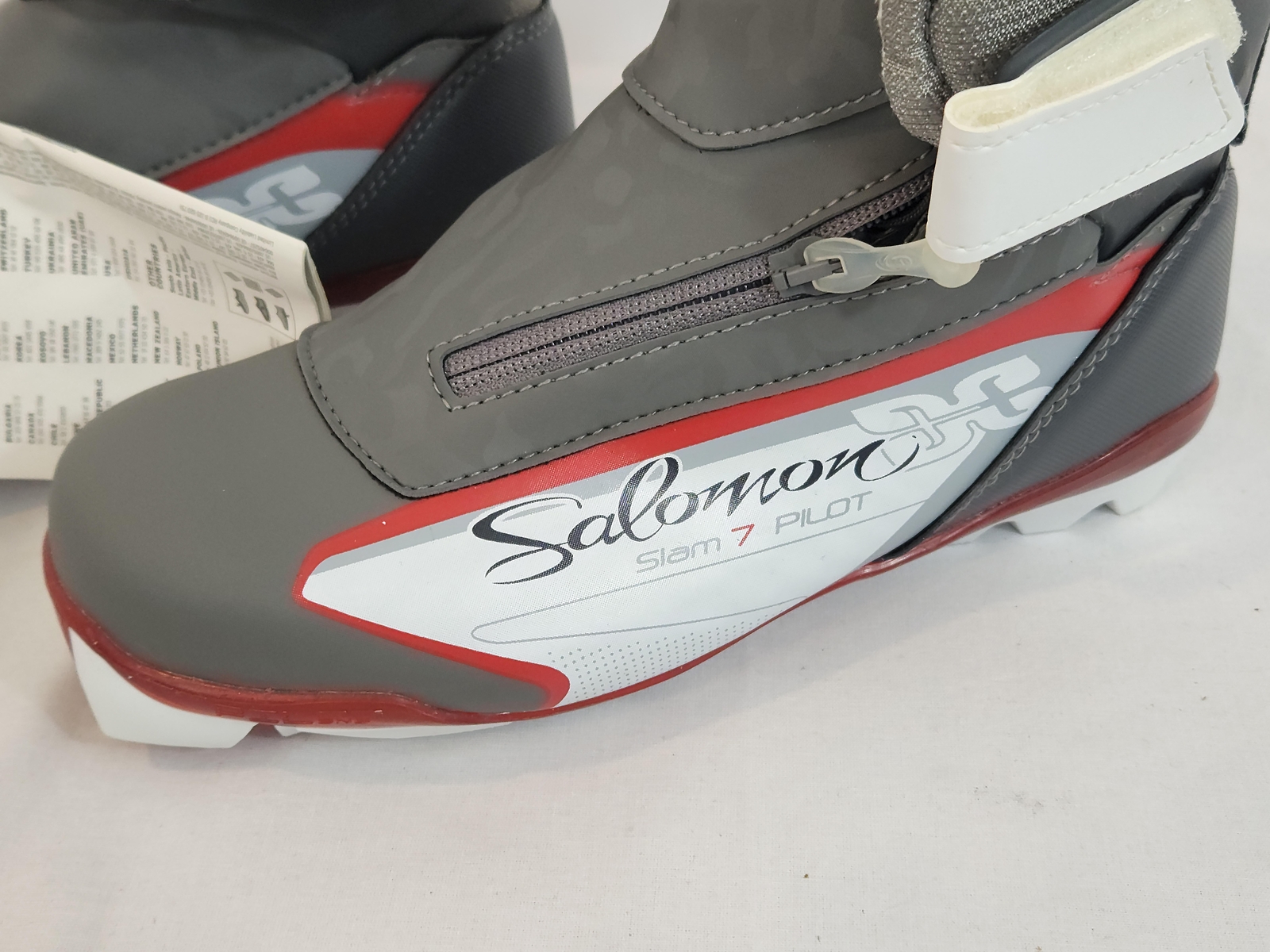 Scarponi da sci Salomon con scatola ed etichetta 5 5 US rosso grigio