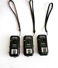 PHOTOGRAPHERS! Phottix Transmitter and Two Receivers for Canon! Tested! Great!