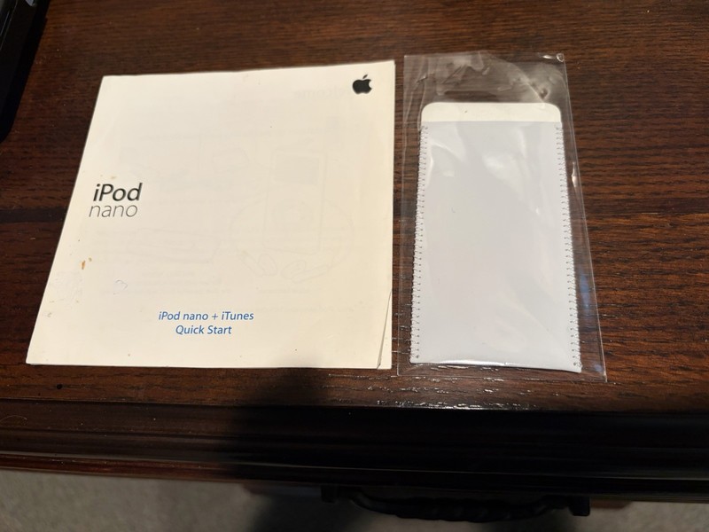 Original iPod Nano 1st Generation Suede Sleeve And Quick Start Booklet