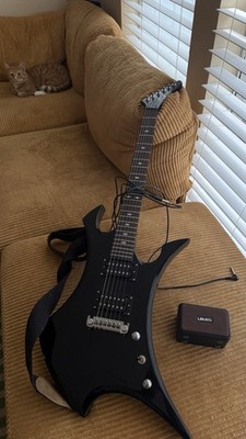 B. C. Rich Electric Guitar Solid With Lekato Amplifier