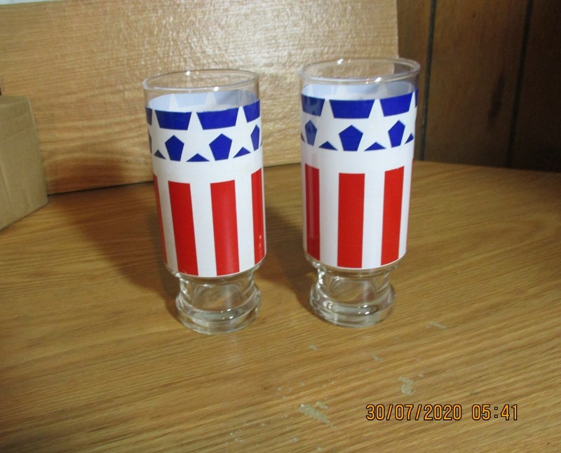 2 TALL GLASSES-RED&WHITE STRIPES-BLUE FIELD around TOP with WHITE STARS