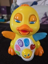 HuiLe Dancing Walking Yellow Duck Baby Toy with Music Lights Up Interactive 
