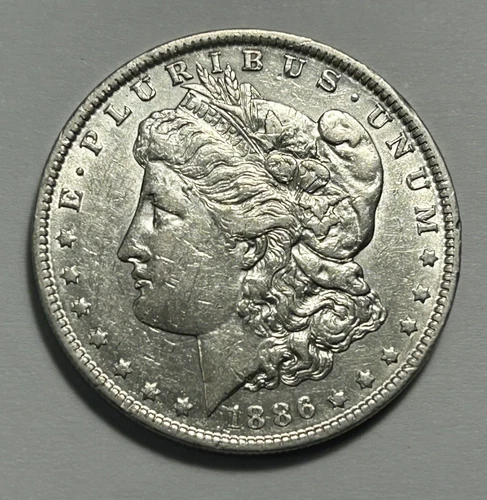 1886 O MORGAN DOLLAR AU