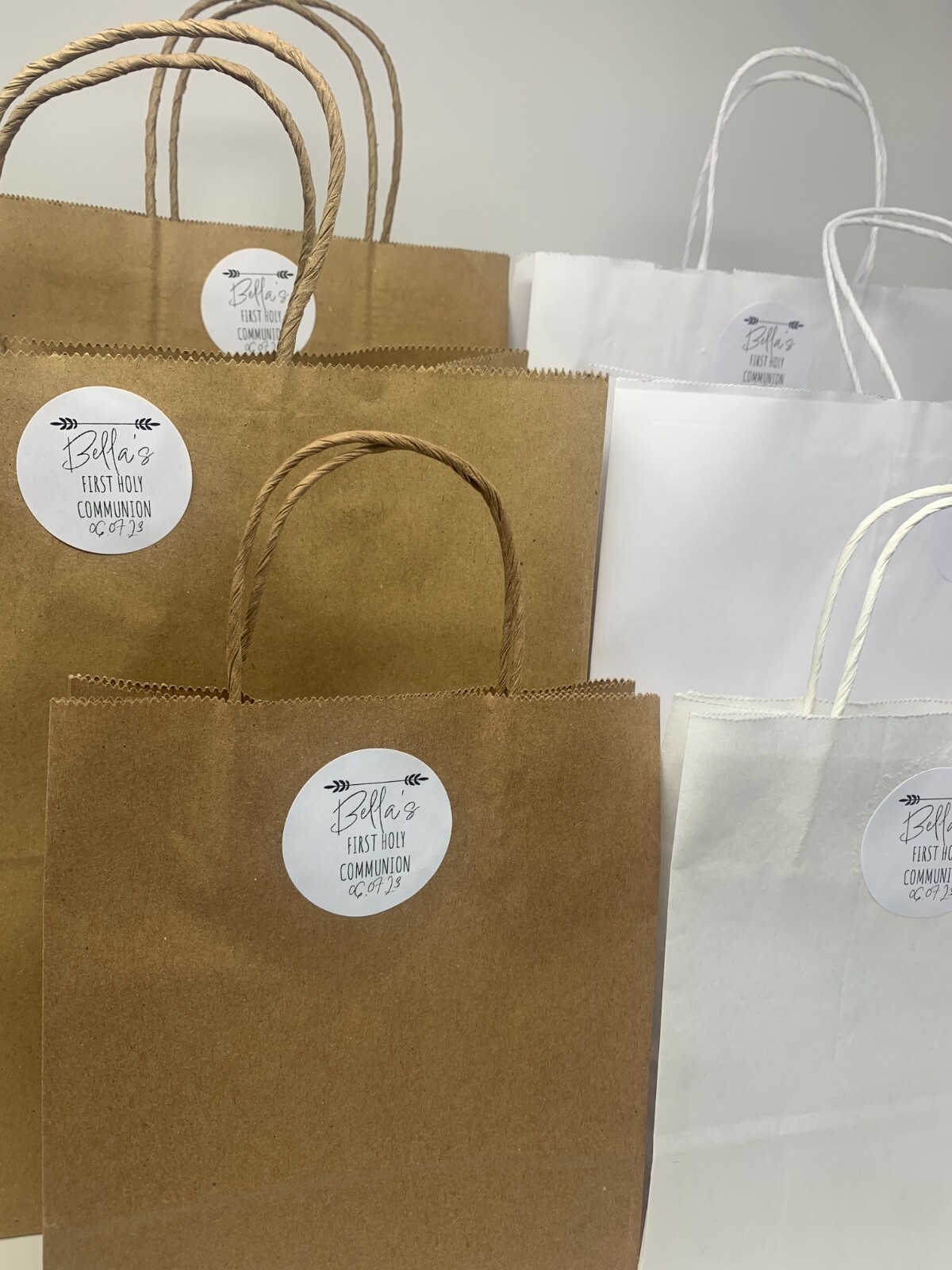 Bolsas de transporte personalizadas con mango giratorio Kraft blancas regalo de agradecimiento
