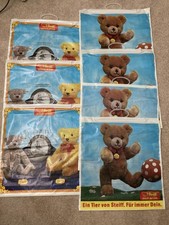 STEIFF SHOPPING BAGS--9 PLASTIC, 4 PAPER AND 2 CATALOGS