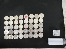 Washington Quarters 90% Silver Roll  of 40. Price is  under melt value!