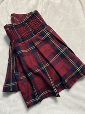 Justice red plaid skirt, spring-loaded in the back with shorts underneath