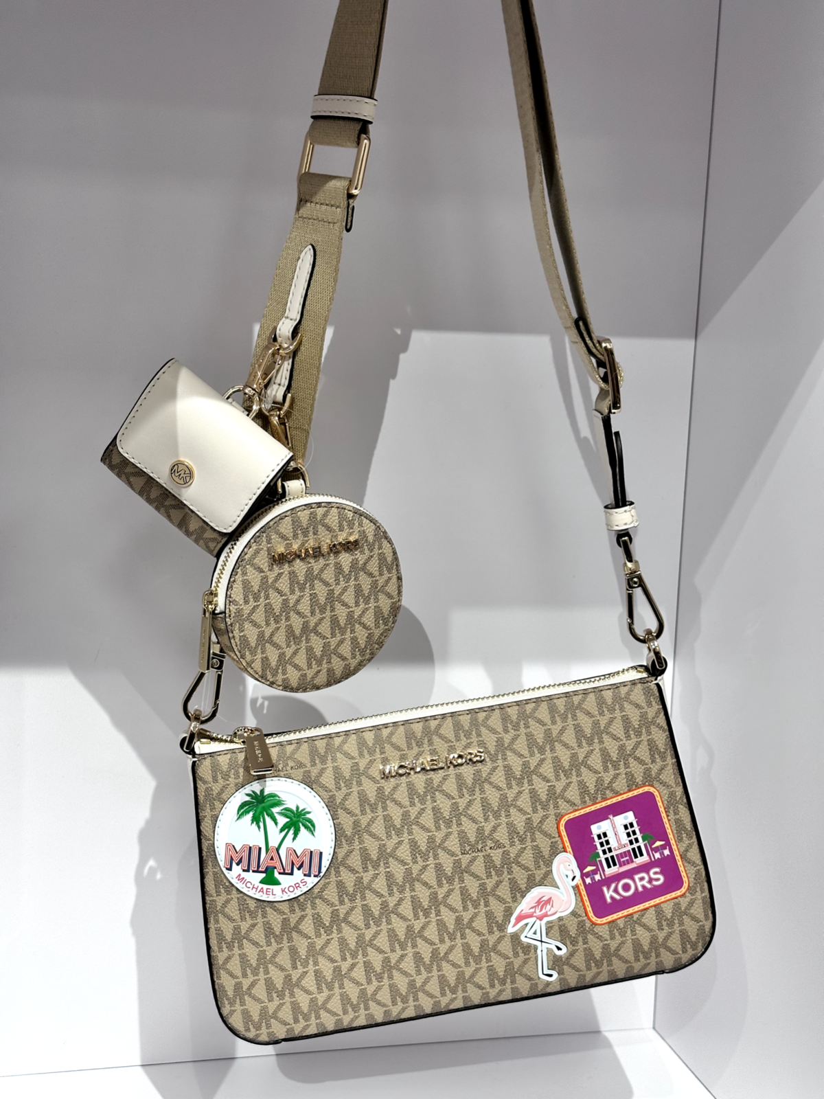 Michael Kors Jet Set Crossbody Bag With Tech Accessories Attachments Light  Cream