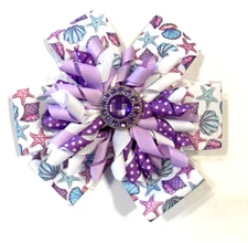 Beautiful Purple Faux Jewel with Seashells inspired hair bow for girls.