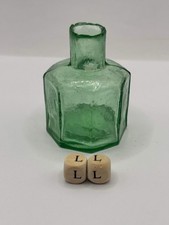 Old green glass ink, inkwell. (LL)