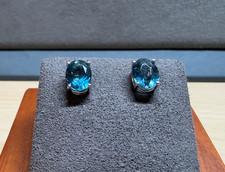 14K White Gold Swiss Blue Topaz 8mm X 6mm Oval Stud Earrings