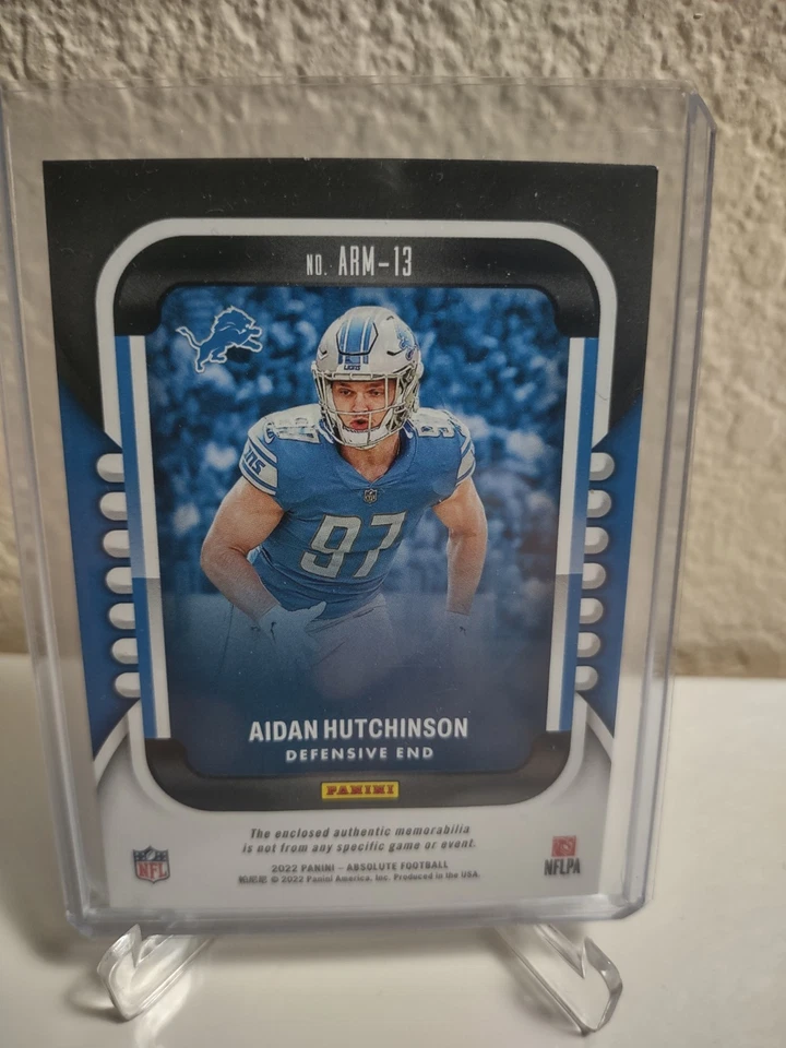 2022 Panini Absolute - Absolute Rookie Materials Aidan Hutchinson #ARM-13 RC) - Image 2 of 2