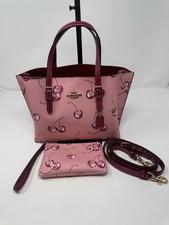 Coach Mollie Tote Bag and Corner Zip Wristlet in cherry print.