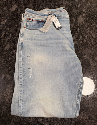 Tommy Hilfiger THFLEX Men s Blue Denim Jeans Slim Fit Mid Rise Light Wash