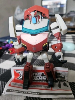 Transformers Animated Deluxe Cybertron Ratchet Comp. 2010 TRU
