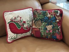 2 Vintage Christmas Throw Pillows 8x7  Santa And Sled With Toys.