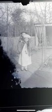 GLASS NEGATIVE c1910 CHILD GIVING SMALLER CHILD PIGGY BACK iBIKE IN SHED